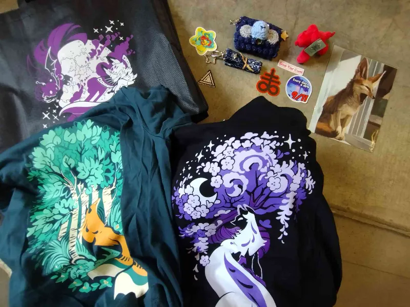 A large collection of merch I got, listed above